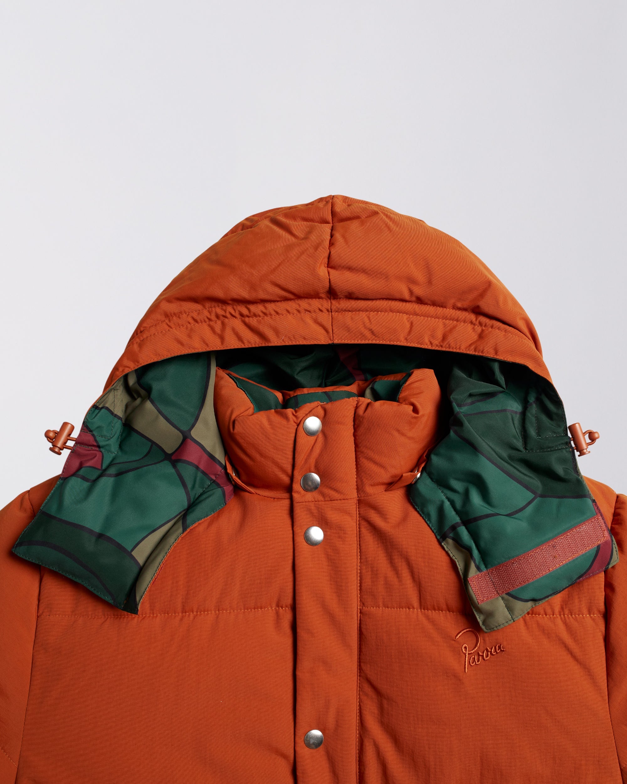 Trees in wind puffer jacket